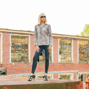 Catherine atop shipping platform at mill